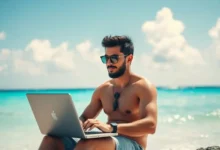 Empreendedor digital trabalhando em um laptop na praia.