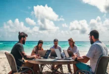 Grupo de nômades digitais trabalhando em estratégias de negócios na praia.