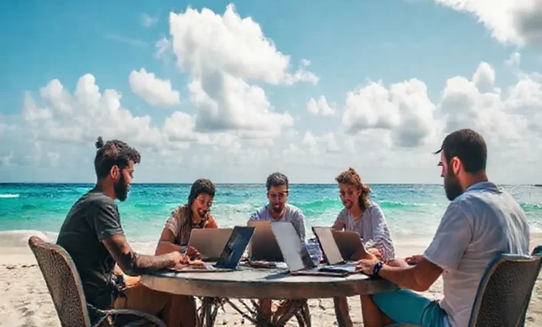 Grupo de nômades digitais trabalhando em estratégias de negócios na praia.