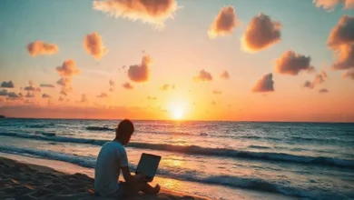 Pôr do sol sobre a praia com um nômade digital trabalhando.