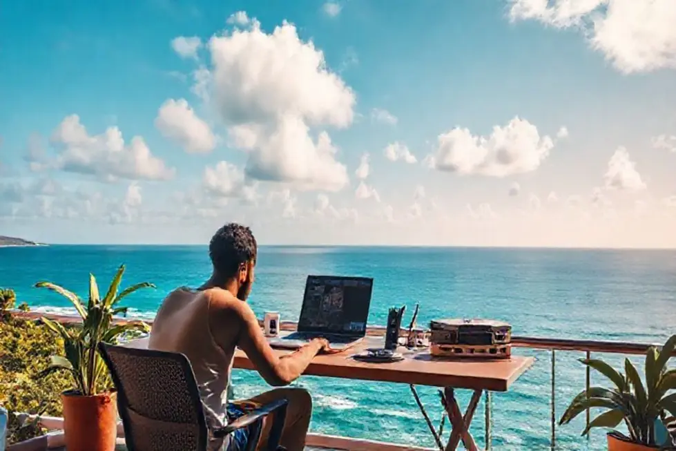 Espaço de trabalho de um nômade digital com vista para o oceano.