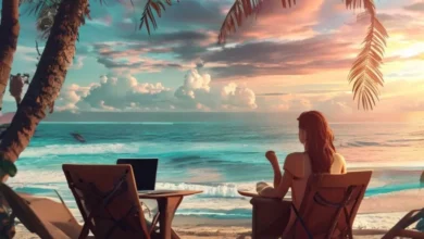 Digital nomad at a beach cafe working on a laptop