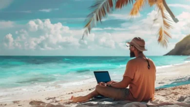 Um nômade digital trabalhando na praia, representando liberdade e sucesso.