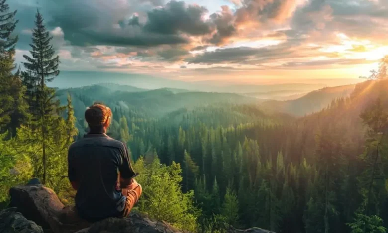 Nômade digital contemplando uma paisagem natural.