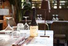 a bottle of wine sitting on top of a table