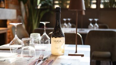 a bottle of wine sitting on top of a table