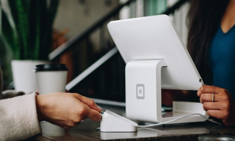 white monitor on desk