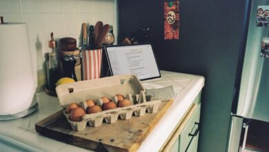 Carton of brown eggs on a kitchen counter
