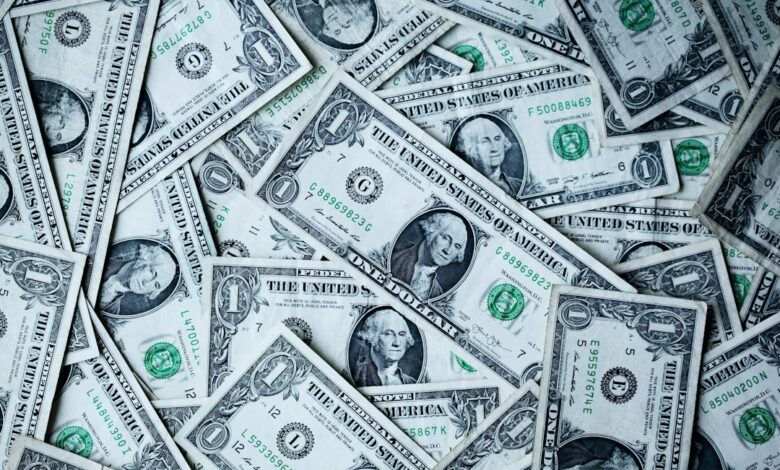 Como Criar uma Renda Passiva com Investimentos em Ouro Digital - Web Nômade Digital 1 U.S.A dollar banknotes