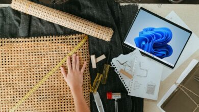 a person is working on a project with a laptop